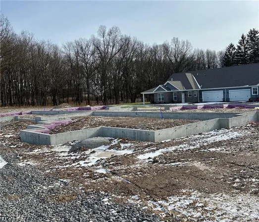 a view of a yard with a house