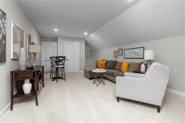 a living room with furniture and a couch