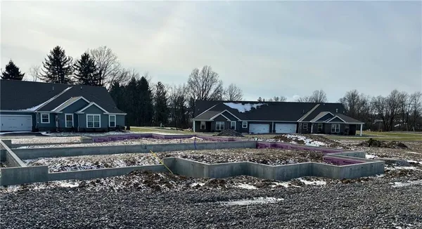a view of a town with barn house