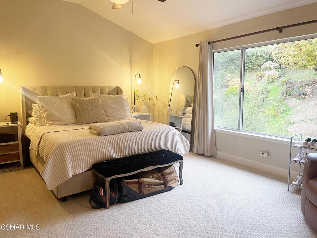 2437 Whitechapel Place Thousand Oaks, CA 91362 - Photo 19 of 36 a spacious bedroom with a bed and wooden floor