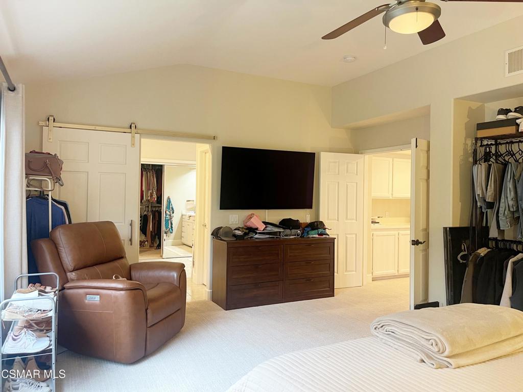 2437 Whitechapel Place Thousand Oaks, CA 91362 - Photo 22 of 36 a living room with furniture and a flat screen tv