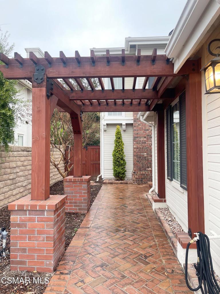 2437 Whitechapel Place Thousand Oaks, CA 91362 - Photo 3 of 36 a view of a patio with a table and chairs
