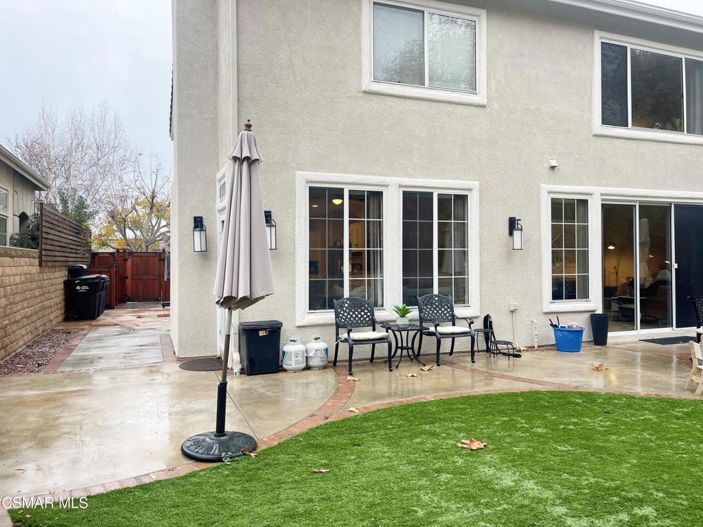 2437 Whitechapel Place Thousand Oaks, CA 91362 - Photo 34 of 36 a front view of a building with outdoor seating