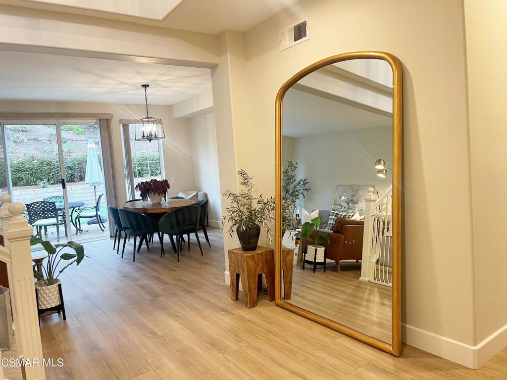 2437 Whitechapel Place Thousand Oaks, CA 91362 - Photo 5 of 36 a view of a dining room with furniture window and wooden floor
