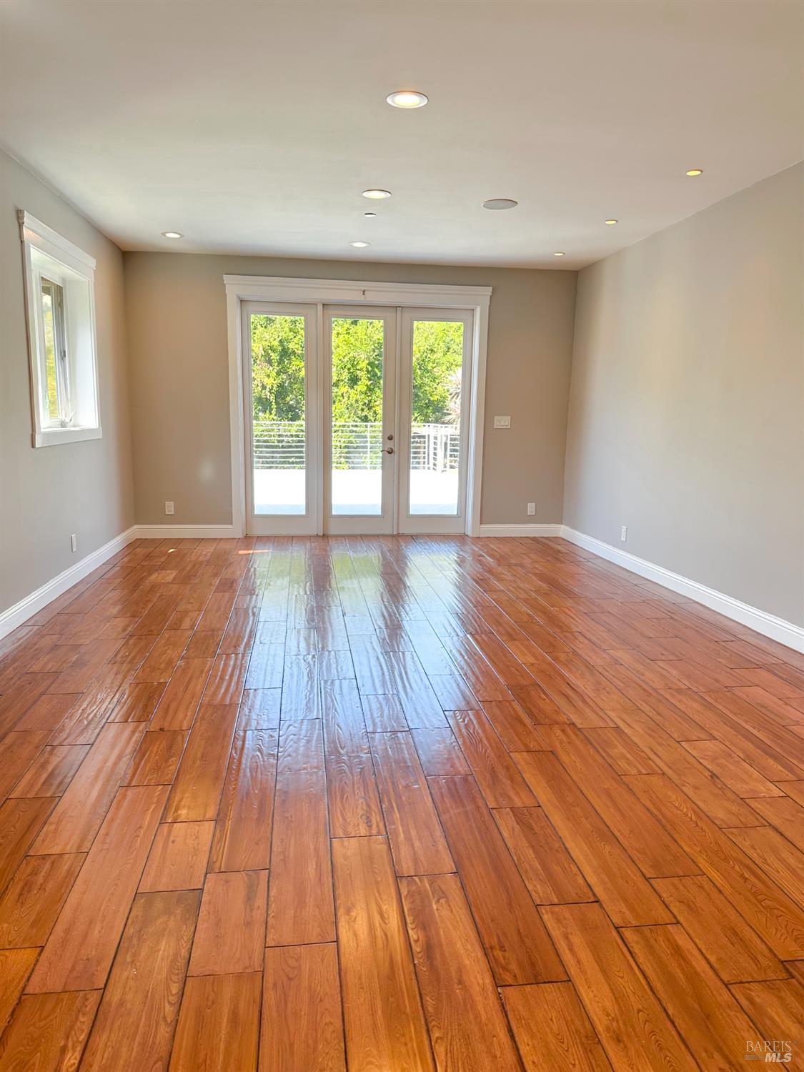 40 Villa Avenue San Rafael, CA 94901 - Photo 23 of 47 a view of an empty room with wooden floor and a window