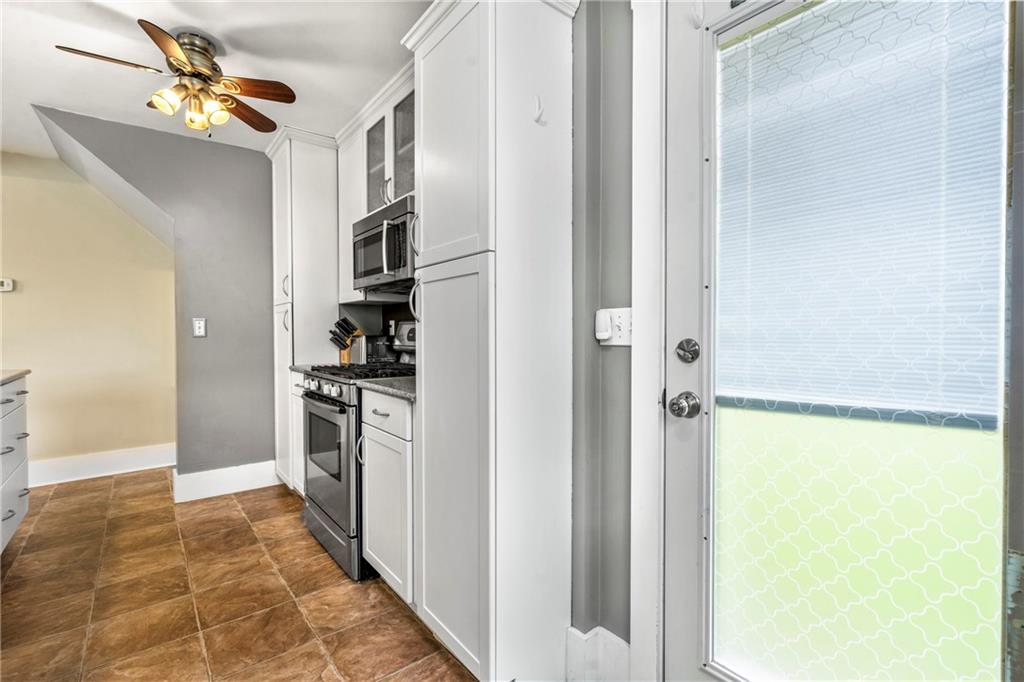 416 Maple Avenue Pittsburgh, PA 15215 - Photo 16 of 38 a view of a kitchen from the hallway