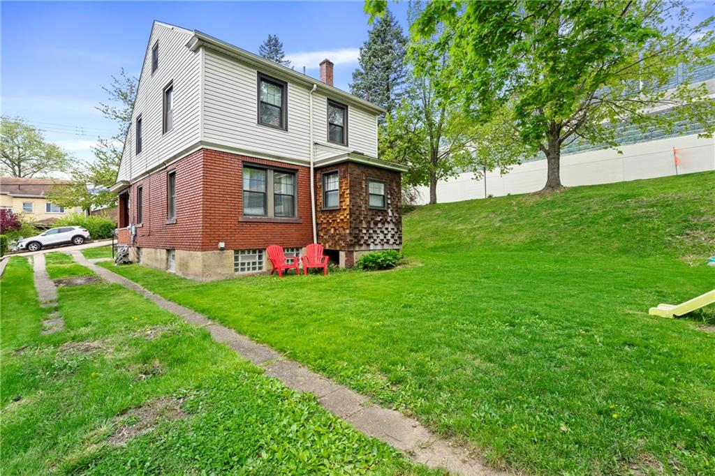 416 Maple Avenue Pittsburgh, PA 15215 - Photo 28 of 38 a front view of a house with garden