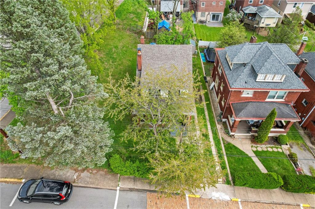 416 Maple Avenue Pittsburgh, PA 15215 - Photo 30 of 38 an aerial view of a house with a yard