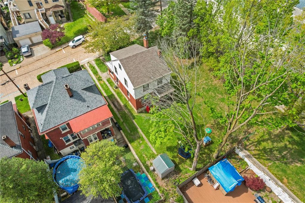 416 Maple Avenue Pittsburgh, PA 15215 - Photo 31 of 38 an aerial view of a house with a yard