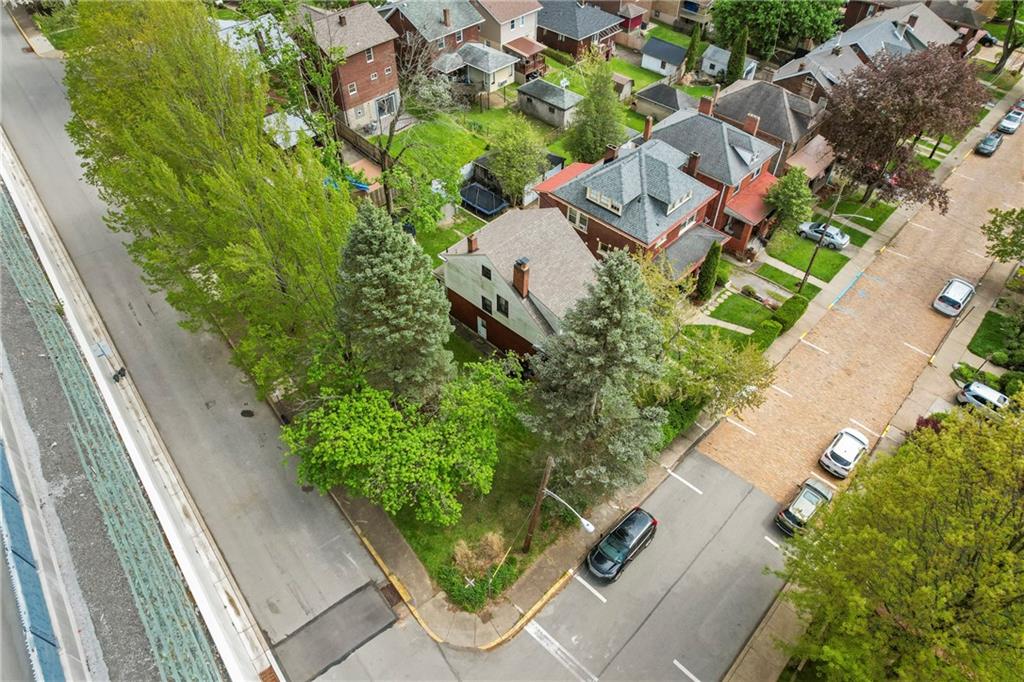 416 Maple Avenue Pittsburgh, PA 15215 - Photo 34 of 38 an aerial view of a house with a yard