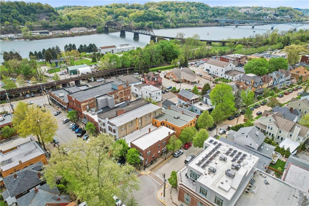 416 Maple Avenue Pittsburgh, PA 15215 - Photo 36 of 38 an aerial view of a house with a lake view