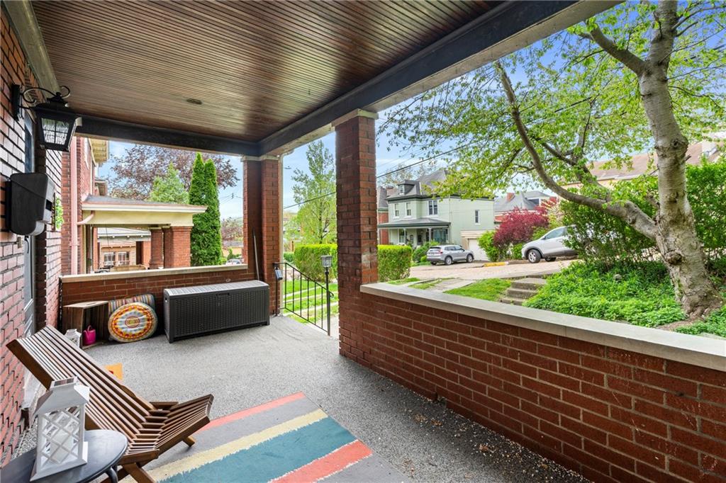 416 Maple Avenue Pittsburgh, PA 15215 - Photo 4 of 38 a living room with patio furniture and a potted plant