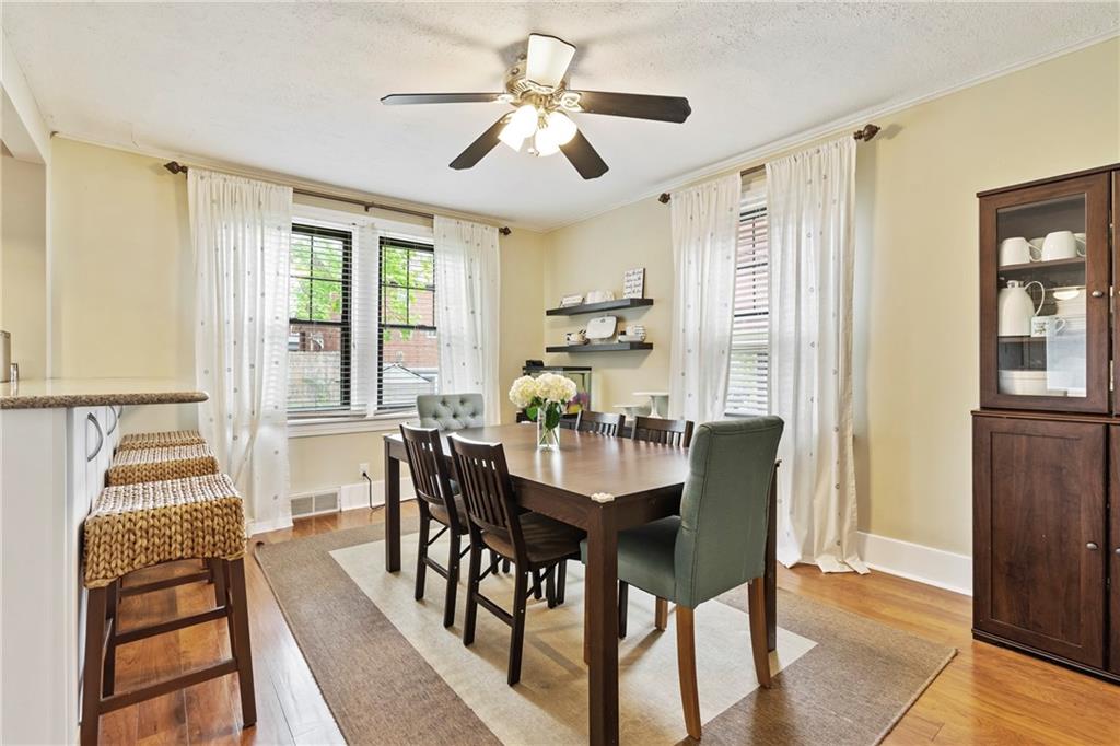 416 Maple Avenue Pittsburgh, PA 15215 - Photo 8 of 38 a view of a dining room with furniture window and outside view