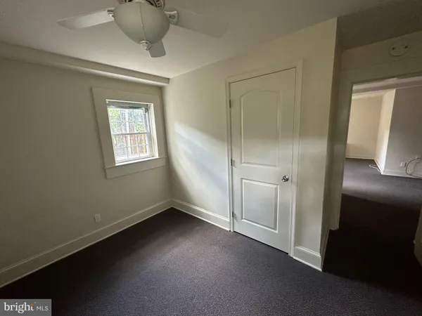 a view of a kitchen with a sink cabinets and window