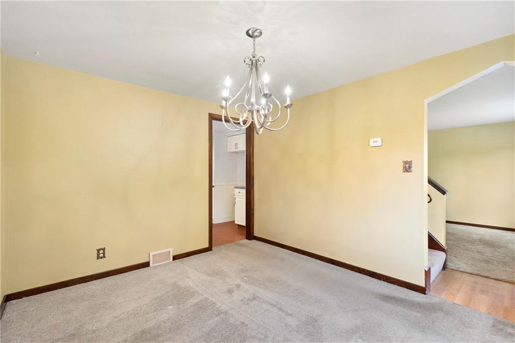 459 Filmore Road Pittsburgh, PA 15221 - Photo 5 of 23 a view of a chandelier in big room and chandelier