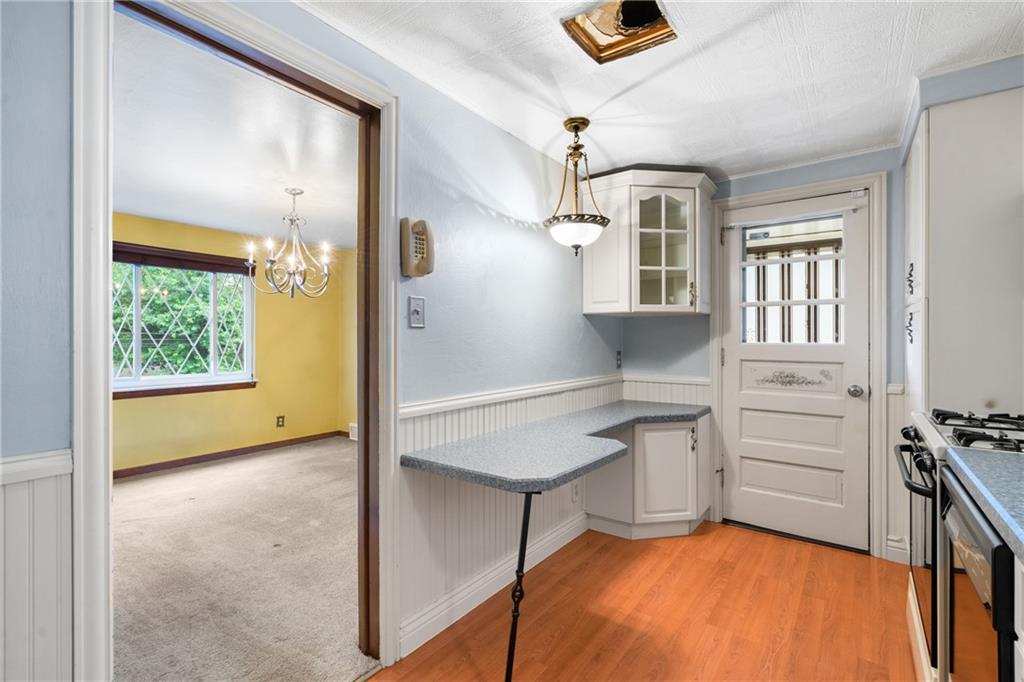 459 Filmore Road Pittsburgh, PA 15221 - Photo 8 of 23 a view of kitchen and living room