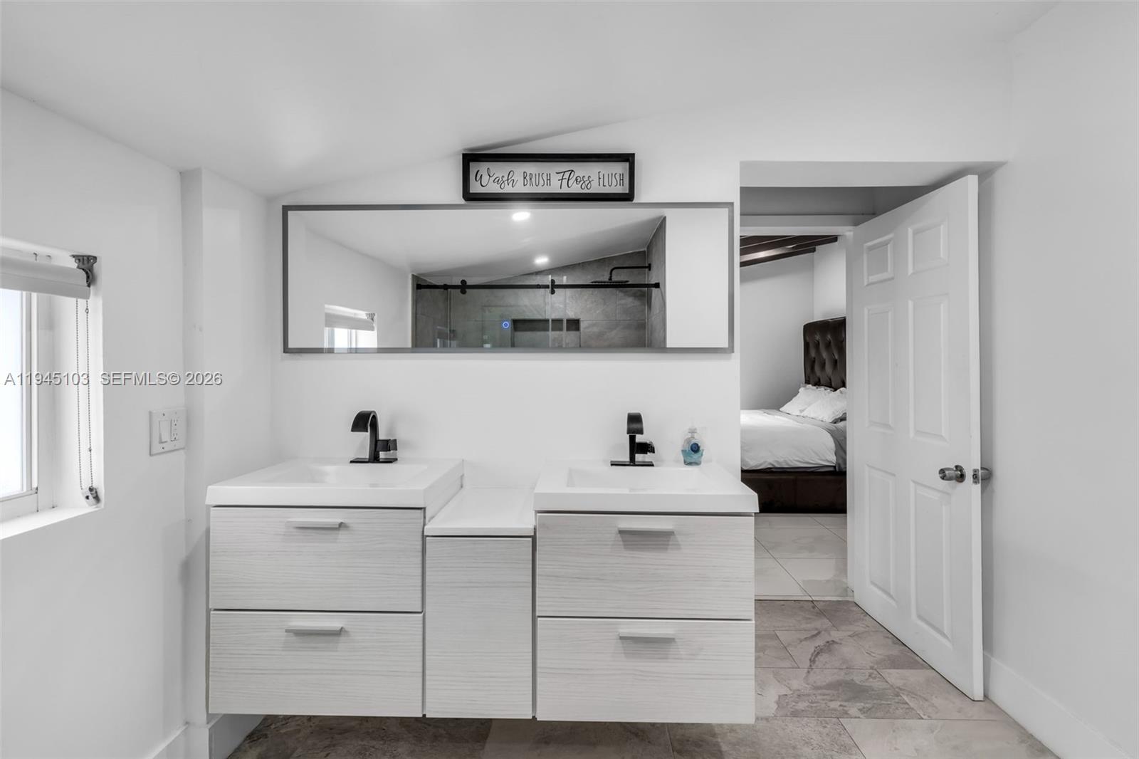 2721 Harding Street Hollywood, FL 33020 - Photo 20 of 38 a kitchen with a sink and a cabinets