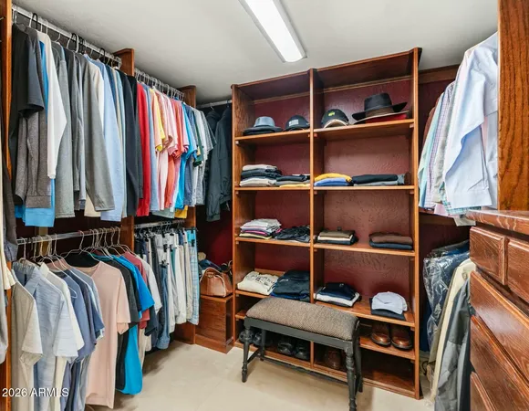 a bathroom with a sink a mirror and a shower