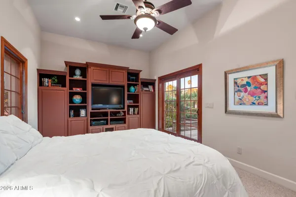 a view of an empty room and entryway