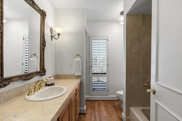 a view of a street with a building in the background