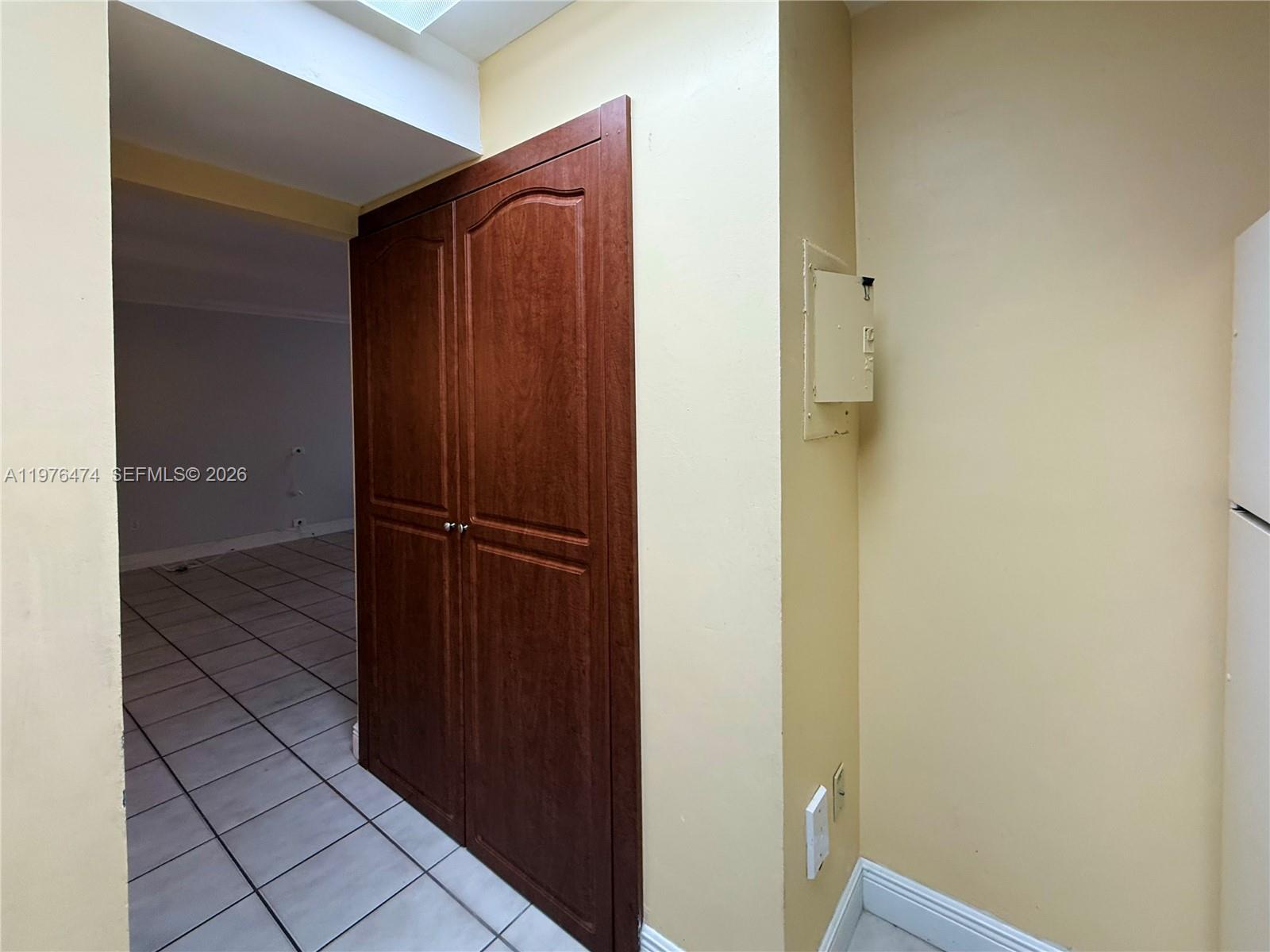 6977 Southwest 115th Place, Unit E33 Miami, FL 33173 - Photo 20 of 32 Laundry & Pantry Closet View