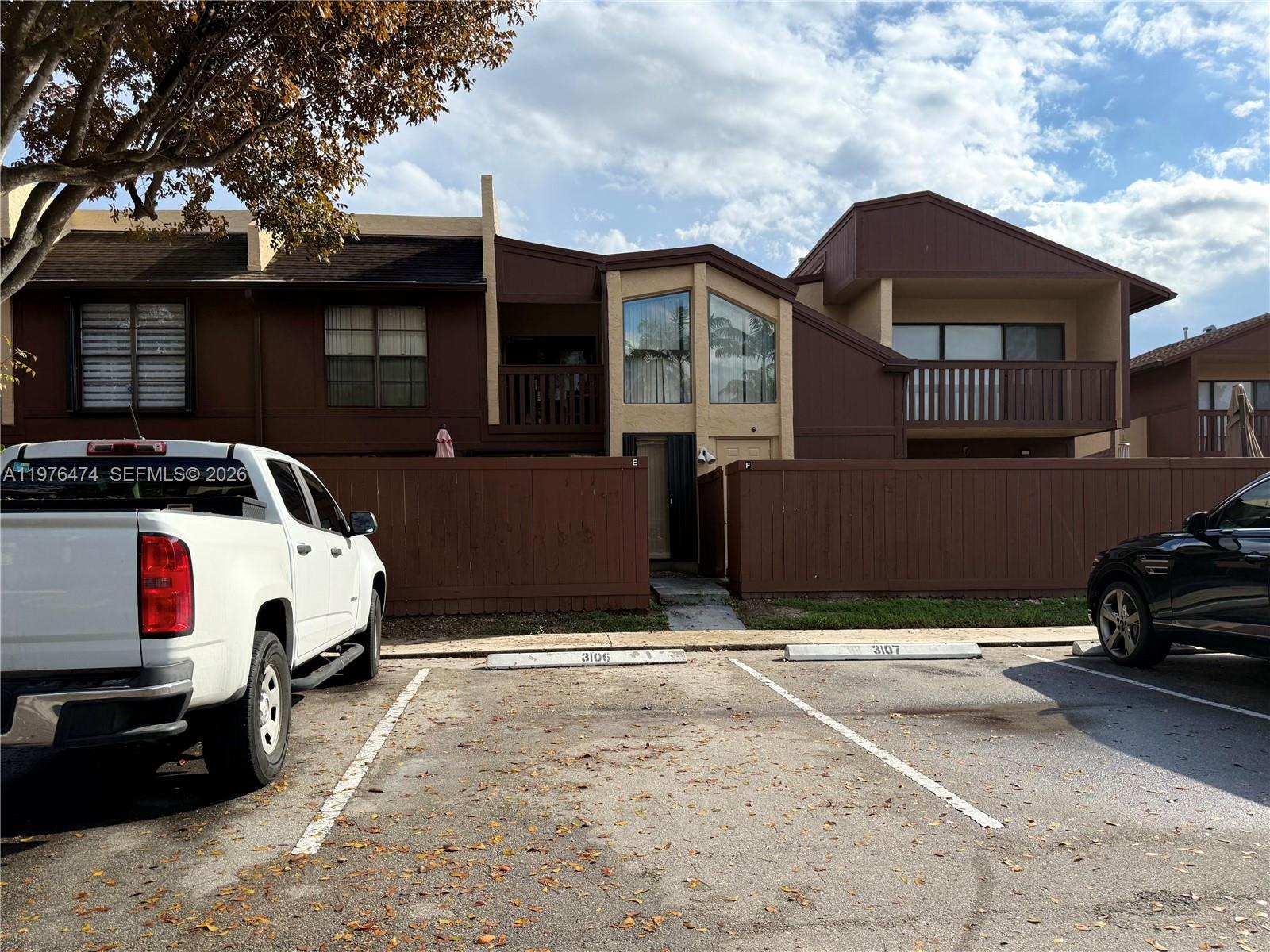 6977 Southwest 115th Place, Unit E33 Miami, FL 33173 - Photo 2 of 32 Parking Space 3106 In Front Of Unit View