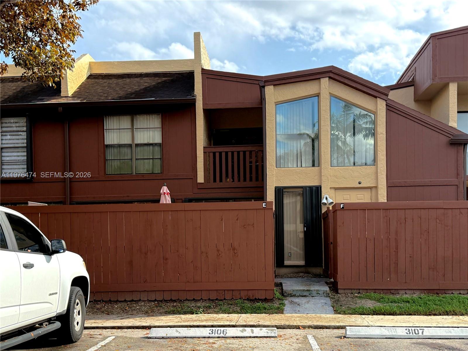 6977 Southwest 115th Place, Unit E33 Miami, FL 33173 - Photo 3 of 32 Exterior Front View