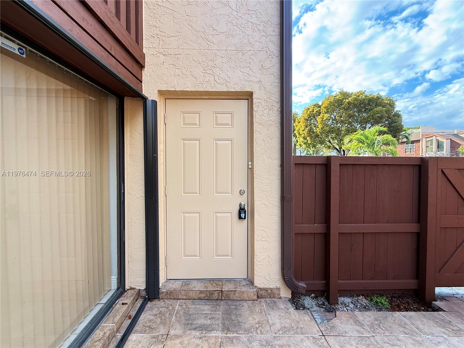 6977 Southwest 115th Place, Unit E33 Miami, FL 33173 - Photo 6 of 32 Front Door View