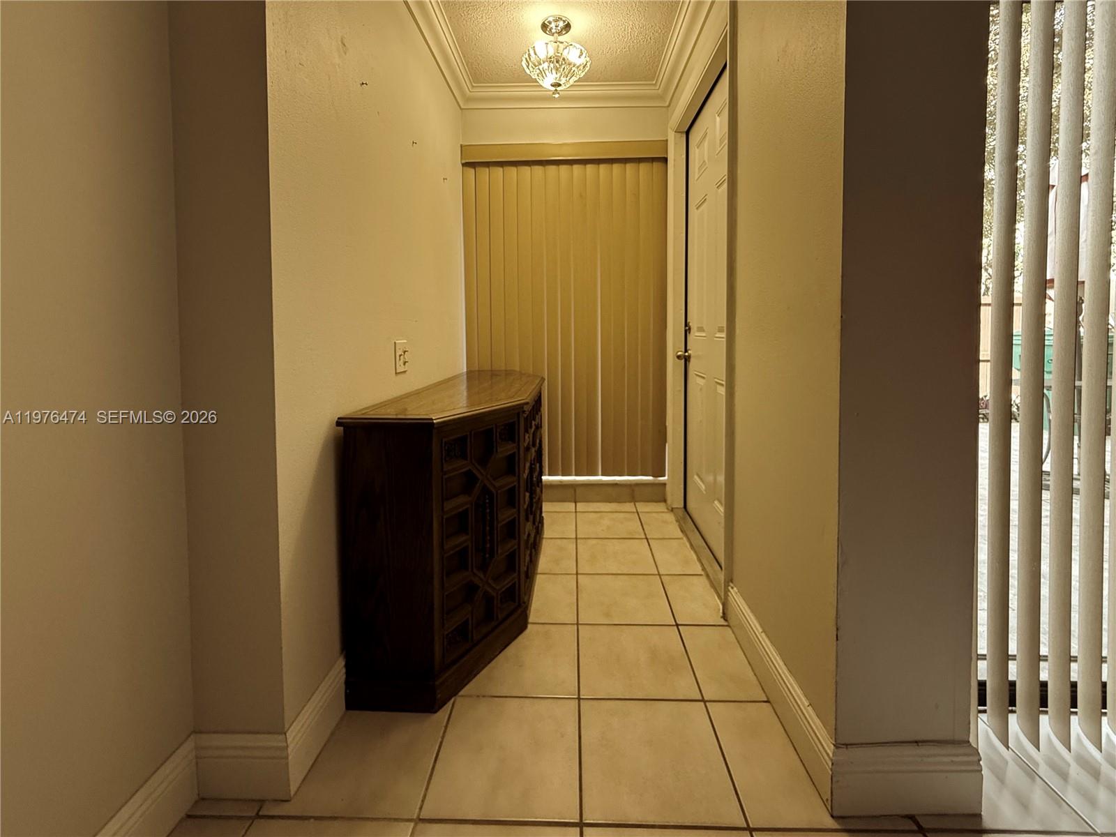 6977 Southwest 115th Place, Unit E33 Miami, FL 33173 - Photo 7 of 32 Foyer View