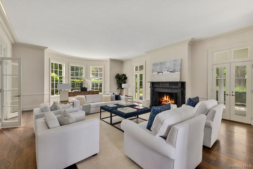 77 Oregon Road Bedford Corners, NY 10549 - Photo 5 of 27 a living room with furniture and a fireplace