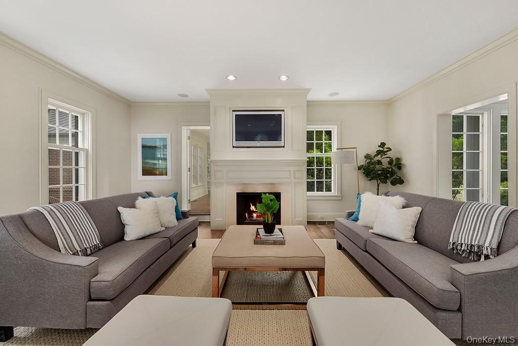 77 Oregon Road Bedford Corners, NY 10549 - Photo 7 of 27 a living room with furniture fireplace and window