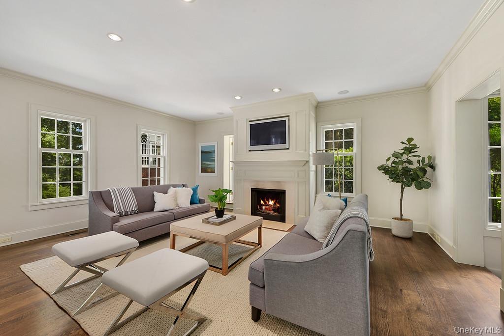 77 Oregon Road Bedford Corners, NY 10549 - Photo 8 of 27 a living room with furniture and a fireplace