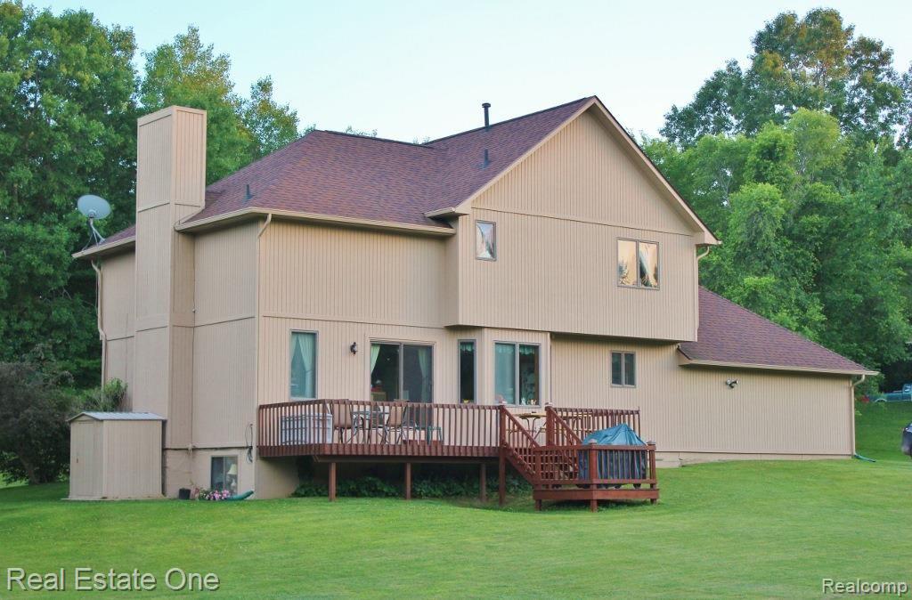 1405 Parker Road Holly, MI 48442 - Photo 3 of 51 Rear elevation with large multi-level decks