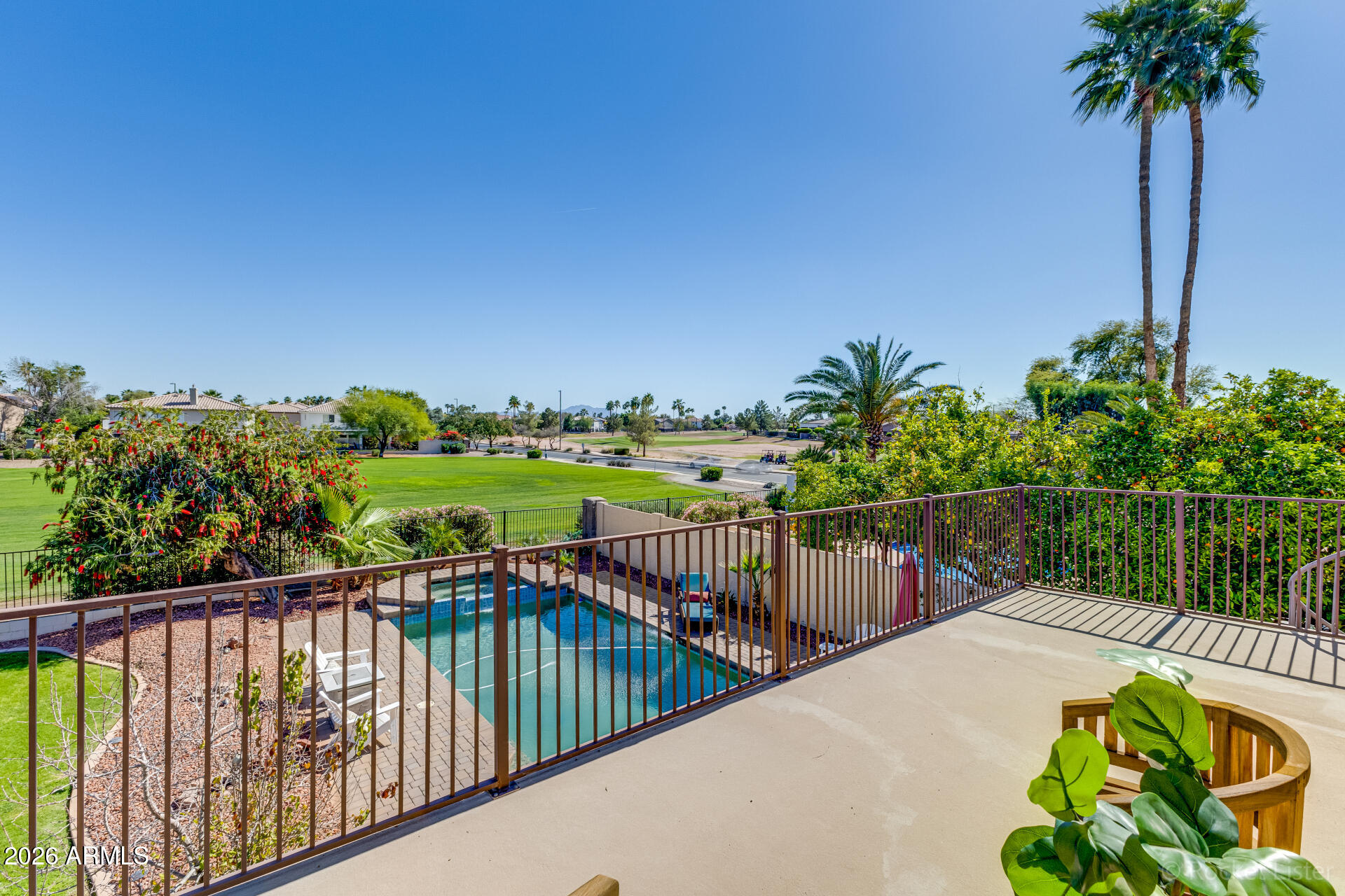 2611 East Catclaw Street Gilbert, AZ 85296 - Photo 16 of 29 a view of a swimming pool with a patio