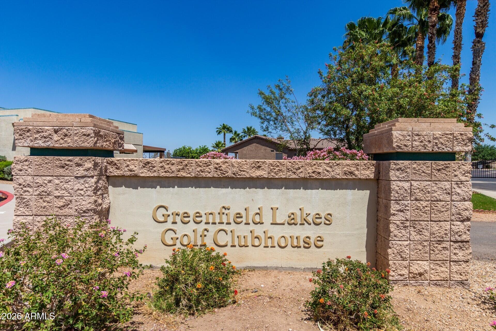 2611 East Catclaw Street Gilbert, AZ 85296 - Photo 28 of 29 a sign on the side of a building