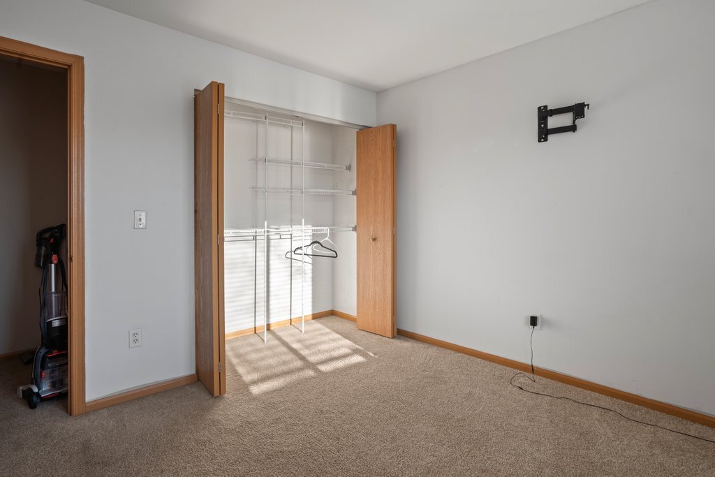 232 Stamford Lane Romeoville, IL 60446 - Photo 25 of 48 a view of a room with an empty space