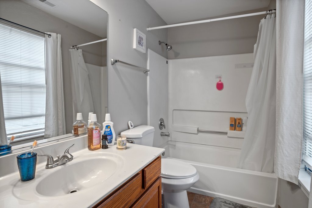 232 Stamford Lane Romeoville, IL 60446 - Photo 30 of 48 a bathroom with a sink toilet and shower