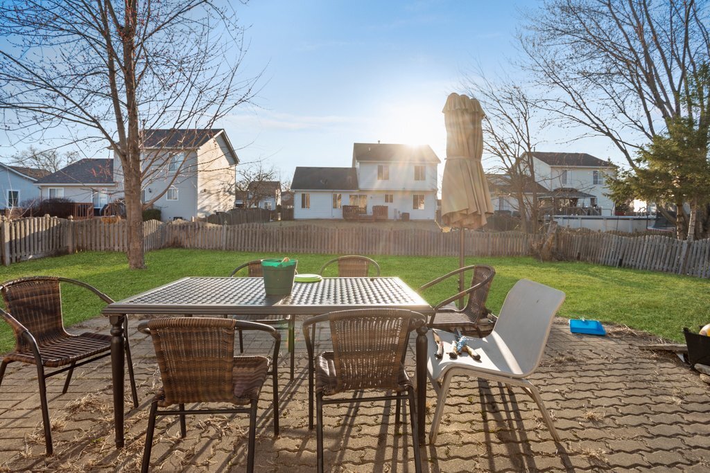 232 Stamford Lane Romeoville, IL 60446 - Photo 33 of 48 a view of a patio with a yard