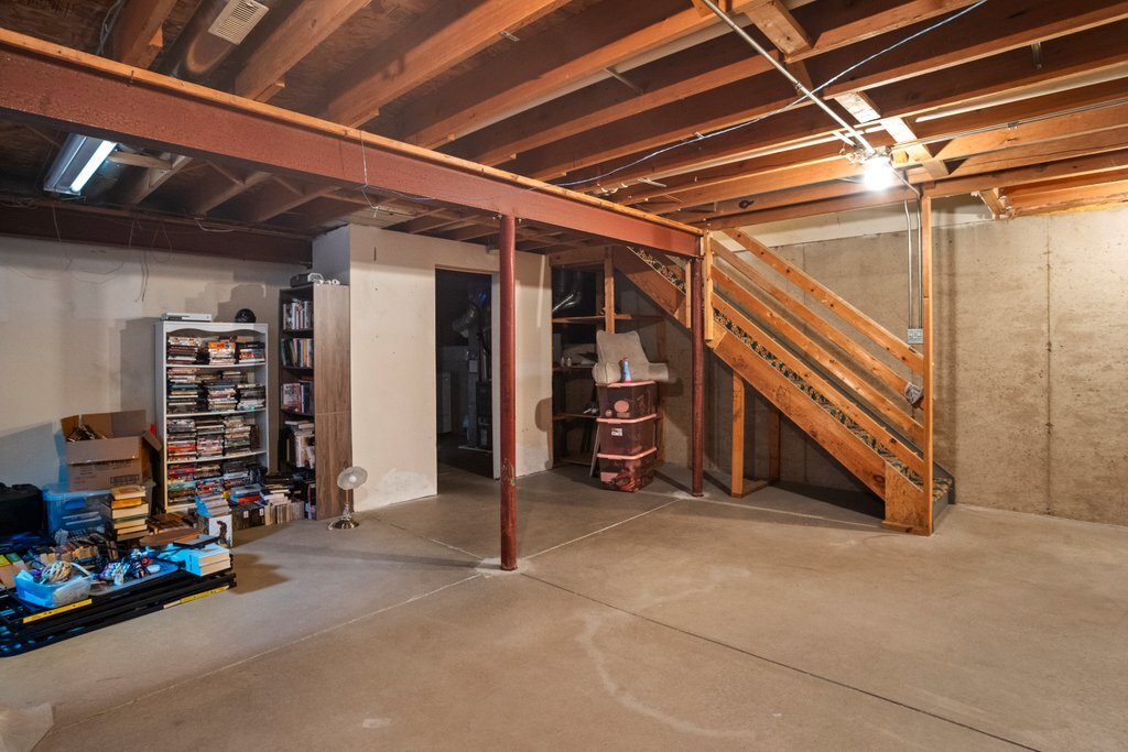 232 Stamford Lane Romeoville, IL 60446 - Photo 39 of 48 a view of an empty room with storage