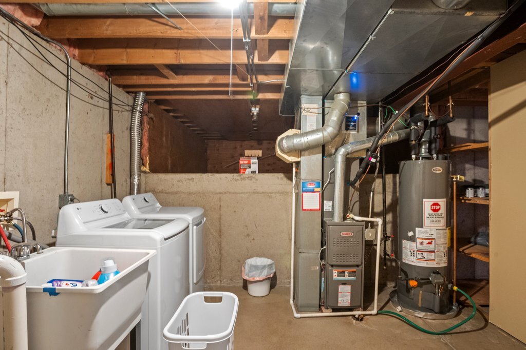 232 Stamford Lane Romeoville, IL 60446 - Photo 41 of 48 a utility room with a refrigerator and washer