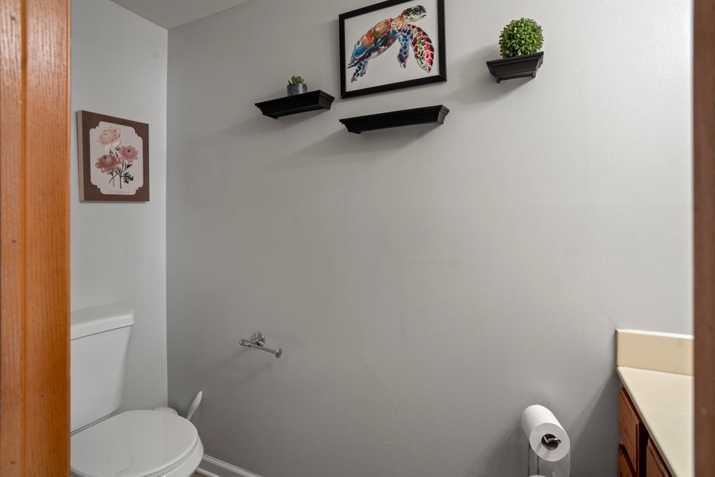 232 Stamford Lane Romeoville, IL 60446 - Photo 8 of 48 a bathroom with a toilet and a shower