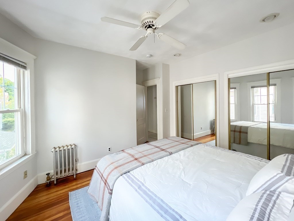 7 Gorham Road Medford, MA 02155 - Photo 17 of 42 a bedroom with a bed and a window