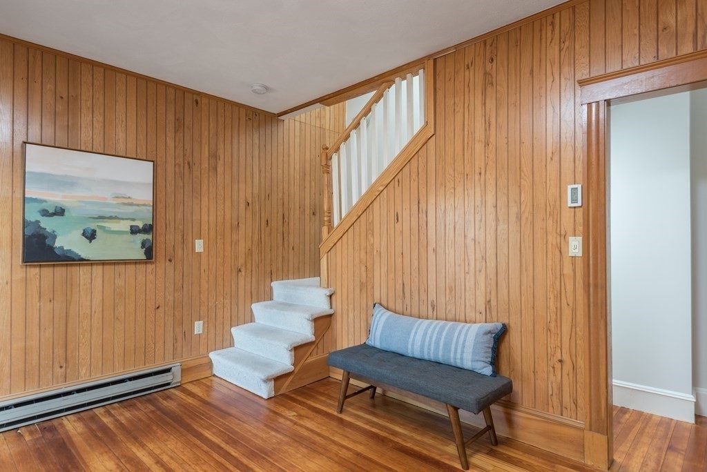 7 Gorham Road Medford, MA 02155 - Photo 22 of 42 a living room with furniture and wooden floor