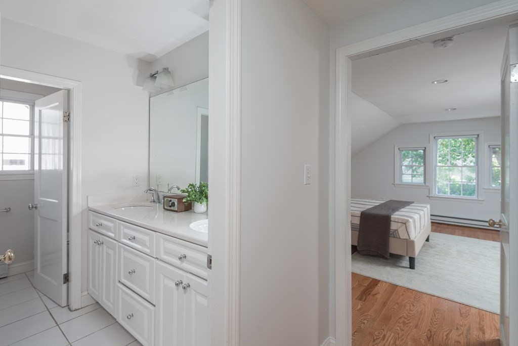 7 Gorham Road Medford, MA 02155 - Photo 27 of 42 a en suite bathroom with a toilet sink and mirror