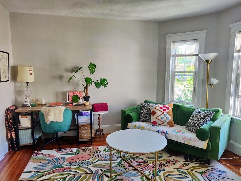 7 Gorham Road Medford, MA 02155 - Photo 31 of 42 a living room with furniture and a window
