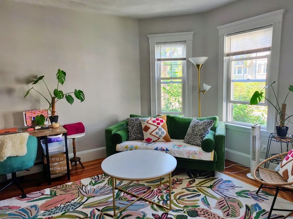 7 Gorham Road Medford, MA 02155 - Photo 32 of 42 a living room with furniture and a window
