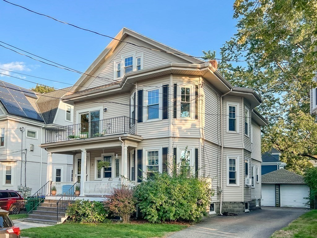 7 Gorham Road Medford, MA 02155 - Photo 38 of 42 a front view of a house with garden