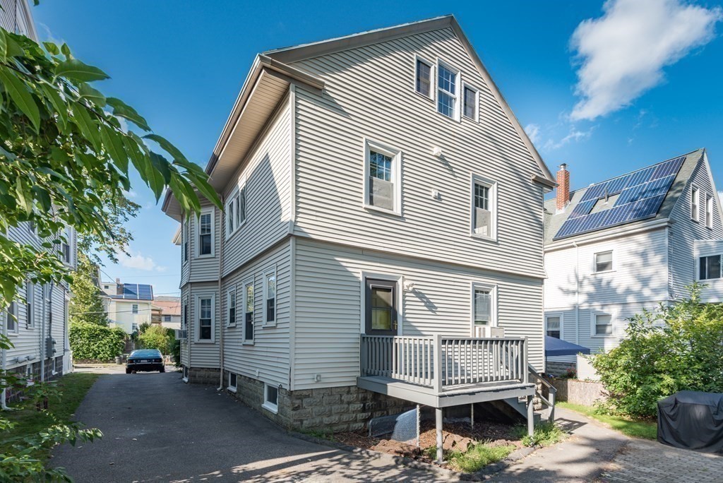 7 Gorham Road Medford, MA 02155 - Photo 40 of 42 a front view of a house with garden