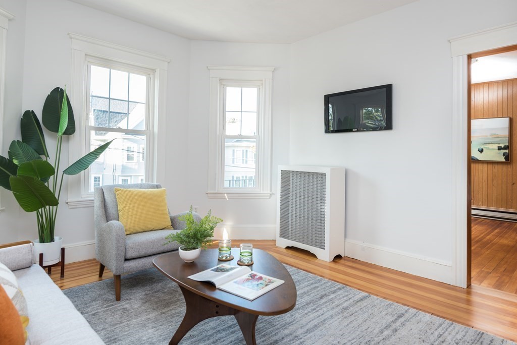 7 Gorham Road Medford, MA 02155 - Photo 4 of 42 a living room with furniture and wooden floor