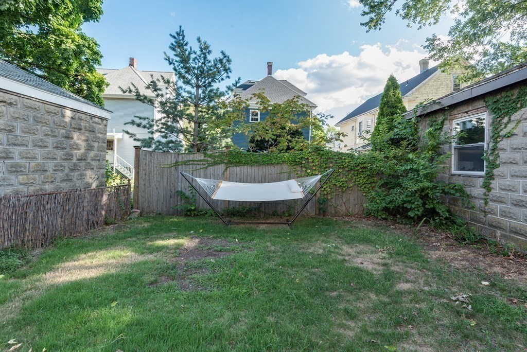 7 Gorham Road Medford, MA 02155 - Photo 42 of 42 a view of a backyard with plants and a garden